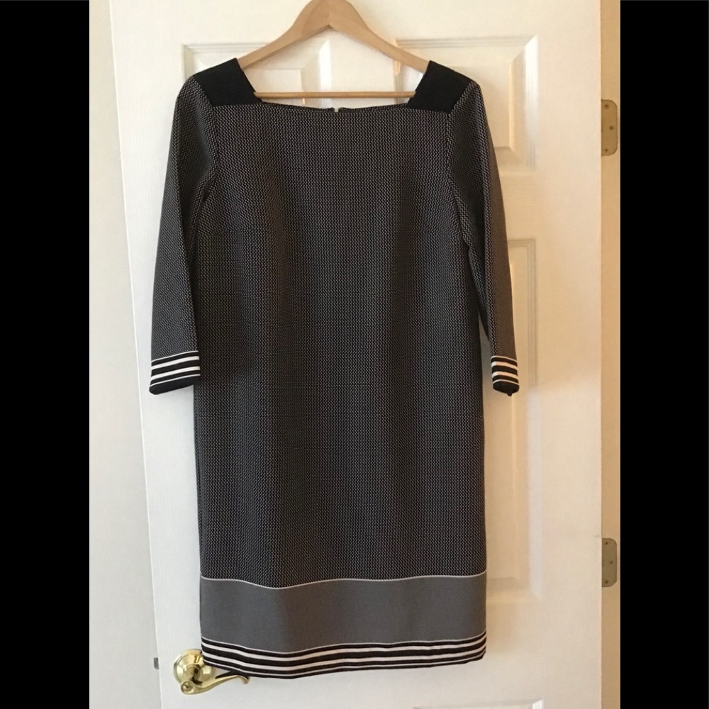 Three quarter sleeve sheath dress.